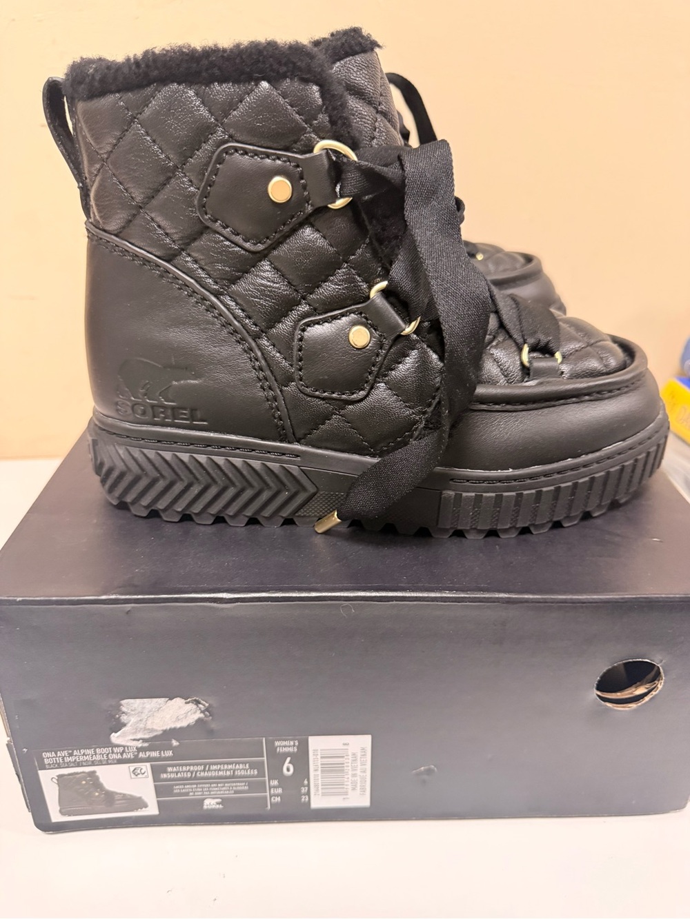 Sorel Kids Black Quilted Lace-Up Winter Boot with Faux Fur